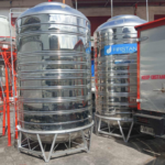 two Firstank vertical stainless steel water storage tank.